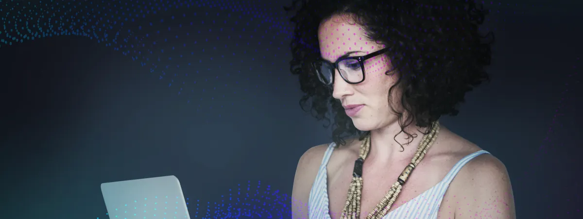 Woman entrepreneur looking at a laptop