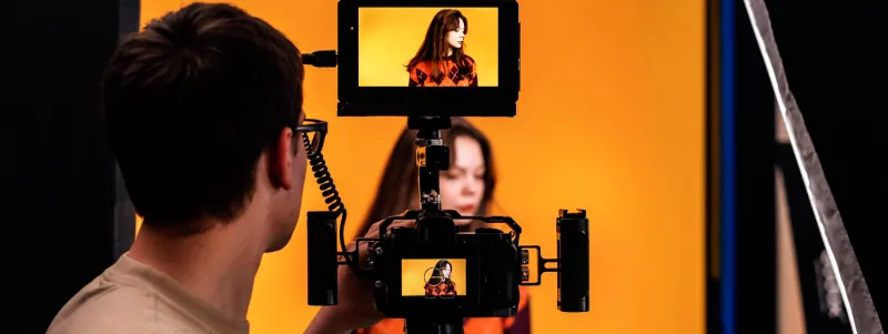 Cameraman filming a scene